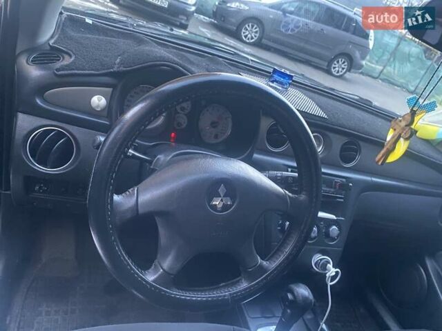 Чорний Міцубісі Аутлендер, об'ємом двигуна 2.4 л та пробігом 168 тис. км за 7100 $, фото 5 на Automoto.ua