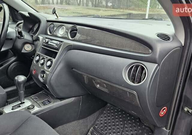 Черный Мицубиси Аутлендер, объемом двигателя 2.4 л и пробегом 167 тыс. км за 6150 $, фото 21 на Automoto.ua