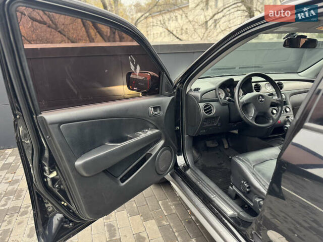 Черный Мицубиси Аутлендер, объемом двигателя 2.4 л и пробегом 242 тыс. км за 6800 $, фото 24 на Automoto.ua