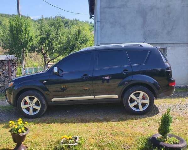 Чорний Міцубісі Аутлендер, об'ємом двигуна 2 л та пробігом 283 тис. км за 9000 $, фото 14 на Automoto.ua