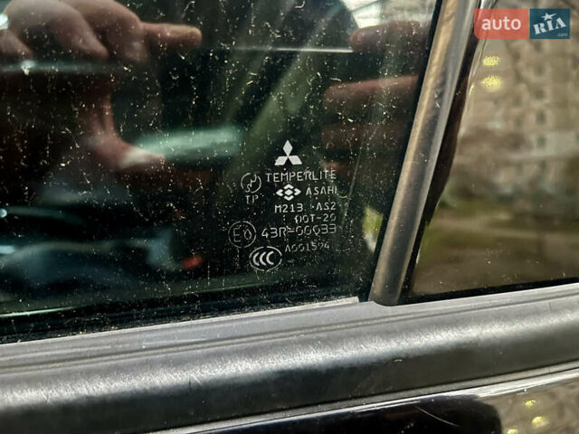 Чорний Міцубісі Аутлендер, об'ємом двигуна 2.38 л та пробігом 247 тис. км за 5499 $, фото 71 на Automoto.ua