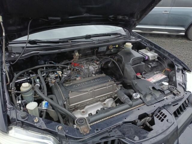 Черный Мицубиси Аутлендер, объемом двигателя 2 л и пробегом 200 тыс. км за 5100 $, фото 22 на Automoto.ua