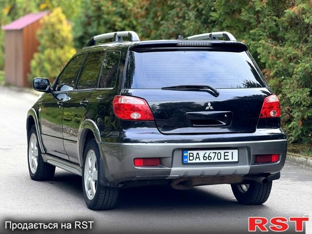 Міцубісі Аутлендер 2006 у Кропивницькому (Кіровограді) на Automoto.ua Чорний Міцубісі Аутлендер, об'ємом двигуна 2.4 л та пробігом 263 тис. км за 5999 $, фото 3 на Automoto.ua