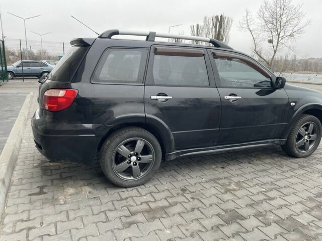 Черный Мицубиси Аутлендер, объемом двигателя 2.4 л и пробегом 234 тыс. км за 5499 $, фото 15 на Automoto.ua