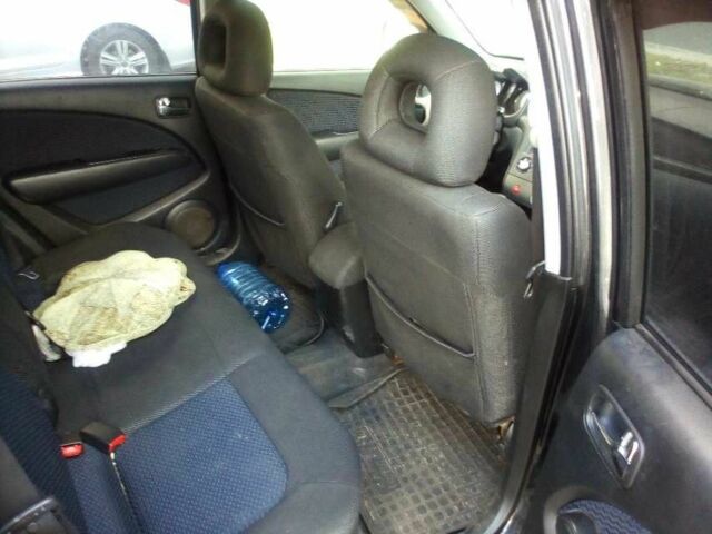 Черный Мицубиси Аутлендер, объемом двигателя 2.4 л и пробегом 240 тыс. км за 5700 $, фото 4 на Automoto.ua