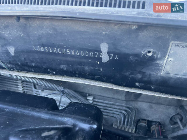 Черный Мицубиси Аутлендер, объемом двигателя 2.38 л и пробегом 230 тыс. км за 5350 $, фото 18 на Automoto.ua