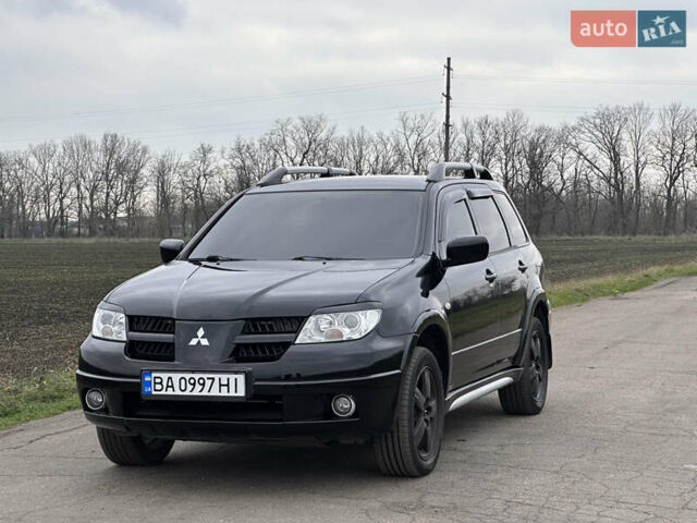 Черный Мицубиси Аутлендер, объемом двигателя 2 л и пробегом 230 тыс. км за 6300 $, фото 14 на Automoto.ua