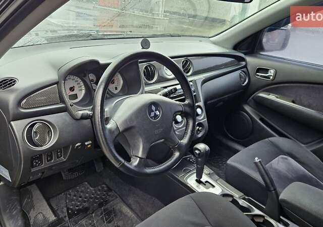 Черный Мицубиси Аутлендер, объемом двигателя 2.4 л и пробегом 167 тыс. км за 6150 $, фото 27 на Automoto.ua