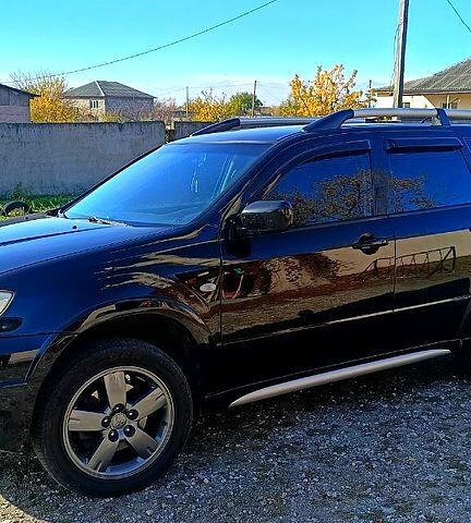 Міцубісі Аутлендер 2006 у Дніпро (Дніпропетровську) на Automoto.ua Чорний Міцубісі Аутлендер, об'ємом двигуна 2.4 л та пробігом 265 тис. км за 7500 $, фото 7 на Automoto.ua