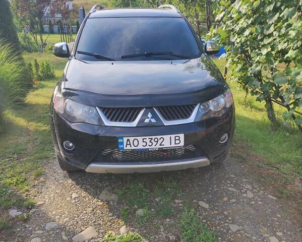 Чорний Міцубісі Аутлендер, об'ємом двигуна 2 л та пробігом 283 тис. км за 9000 $, фото 4 на Automoto.ua
