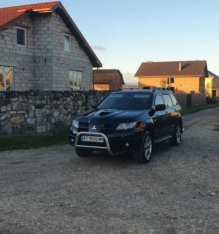 Міцубісі Аутлендер 2006 у Івано-Франківську на Automoto.ua Чорний Міцубісі Аутлендер, об'ємом двигуна 2 л та пробігом 263 тис. км за 7250 $, фото 16 на Automoto.ua