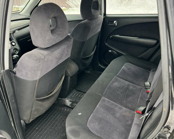 Чорний Міцубісі Аутлендер, об'ємом двигуна 2.4 л та пробігом 308 тис. км за 4700 $, фото 6 на Automoto.ua