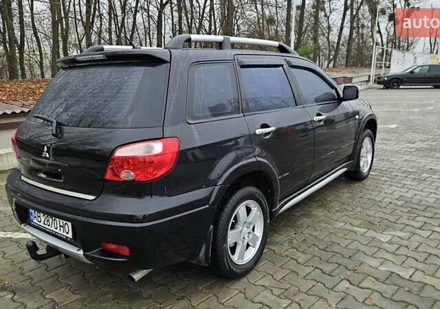 Черный Мицубиси Аутлендер, объемом двигателя 2.4 л и пробегом 167 тыс. км за 6150 $, фото 8 на Automoto.ua