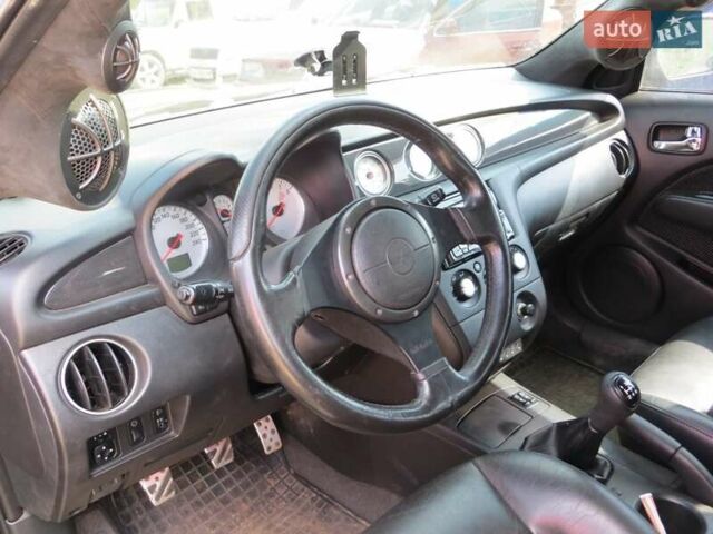 Черный Мицубиси Аутлендер, объемом двигателя 2 л и пробегом 216 тыс. км за 5600 $, фото 5 на Automoto.ua