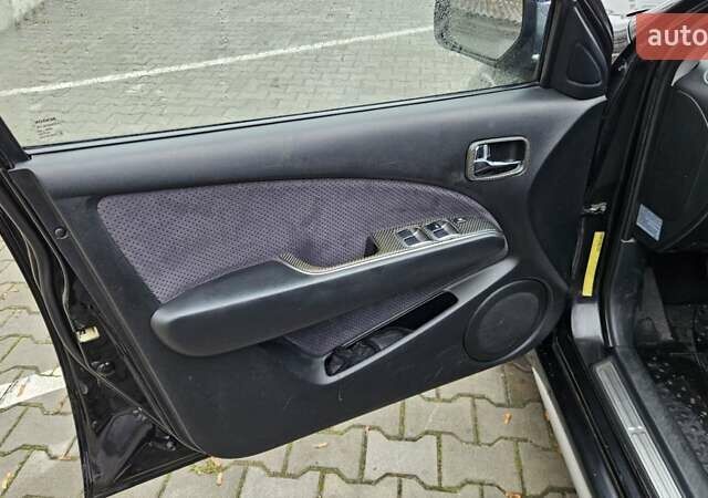 Черный Мицубиси Аутлендер, объемом двигателя 2.4 л и пробегом 167 тыс. км за 6150 $, фото 25 на Automoto.ua