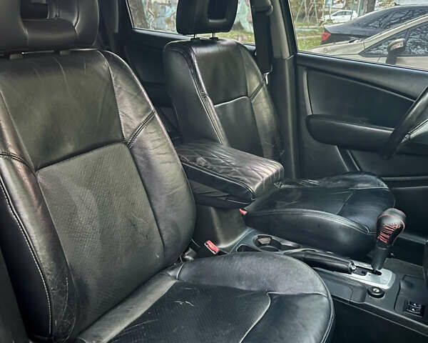 Чорний Міцубісі Аутлендер, об'ємом двигуна 2.38 л та пробігом 247 тис. км за 5499 $, фото 69 на Automoto.ua