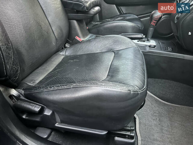 Чорний Міцубісі Аутлендер, об'ємом двигуна 2.38 л та пробігом 247 тис. км за 5499 $, фото 66 на Automoto.ua