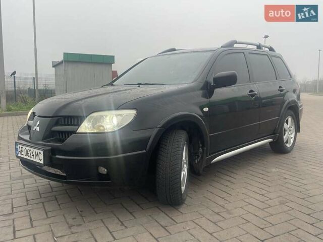 Черный Мицубиси Аутлендер, объемом двигателя 2.4 л и пробегом 277 тыс. км за 6700 $, фото 10 на Automoto.ua