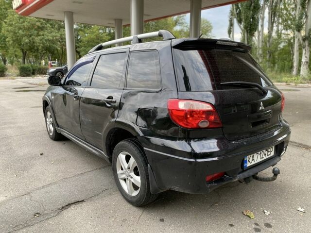 Чорний Міцубісі Аутлендер, об'ємом двигуна 2.4 л та пробігом 239 тис. км за 4200 $, фото 3 на Automoto.ua