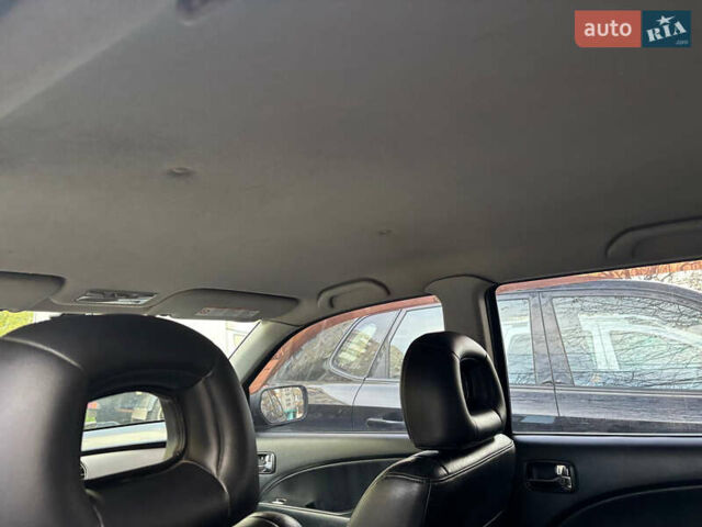 Чорний Міцубісі Аутлендер, об'ємом двигуна 2.38 л та пробігом 247 тис. км за 5499 $, фото 60 на Automoto.ua