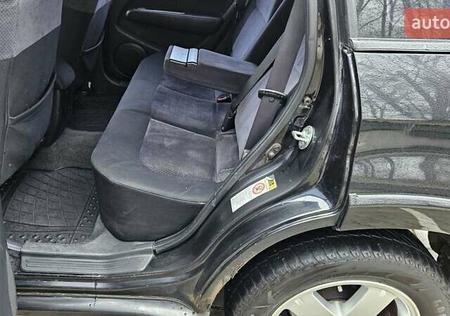 Черный Мицубиси Аутлендер, объемом двигателя 2.4 л и пробегом 167 тыс. км за 6150 $, фото 24 на Automoto.ua