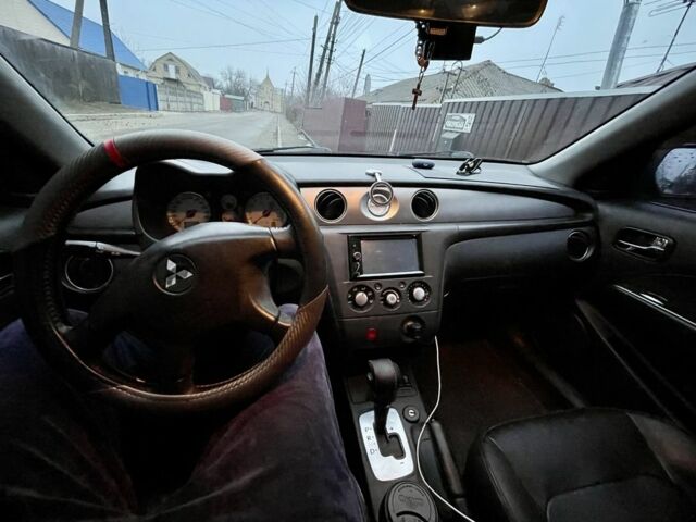 Черный Мицубиси Аутлендер, объемом двигателя 2.4 л и пробегом 234 тыс. км за 5499 $, фото 11 на Automoto.ua