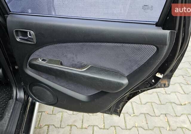 Черный Мицубиси Аутлендер, объемом двигателя 2.4 л и пробегом 167 тыс. км за 6150 $, фото 14 на Automoto.ua