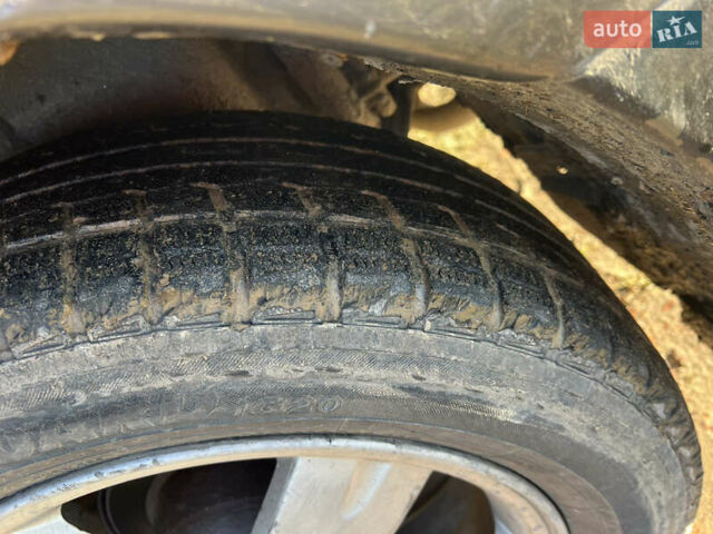 Черный Мицубиси Аутлендер, объемом двигателя 2.38 л и пробегом 230 тыс. км за 5350 $, фото 8 на Automoto.ua