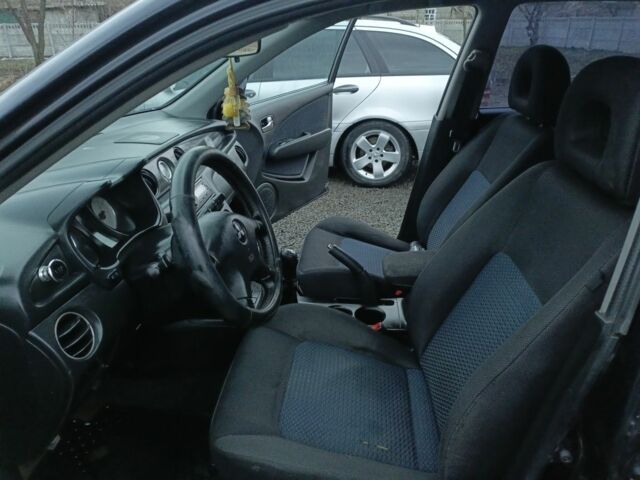 Черный Мицубиси Аутлендер, объемом двигателя 2 л и пробегом 200 тыс. км за 5100 $, фото 18 на Automoto.ua