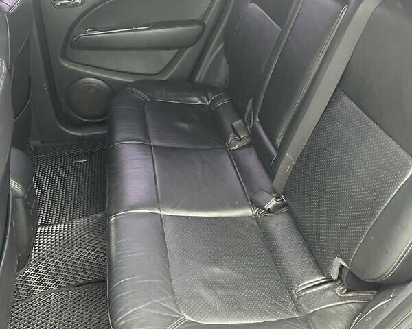 Черный Мицубиси Аутлендер, объемом двигателя 2.4 л и пробегом 277 тыс. км за 6700 $, фото 8 на Automoto.ua