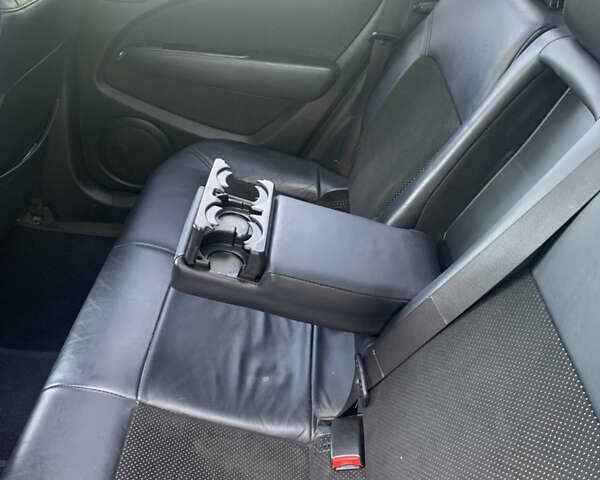 Черный Мицубиси Аутлендер, объемом двигателя 2 л и пробегом 212 тыс. км за 6000 $, фото 31 на Automoto.ua