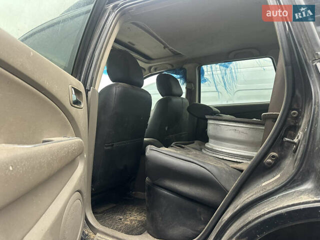 Черный Мицубиси Аутлендер, объемом двигателя 2.4 л и пробегом 240 тыс. км за 2200 $, фото 11 на Automoto.ua