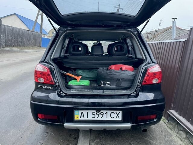 Черный Мицубиси Аутлендер, объемом двигателя 2.4 л и пробегом 234 тыс. км за 5499 $, фото 8 на Automoto.ua