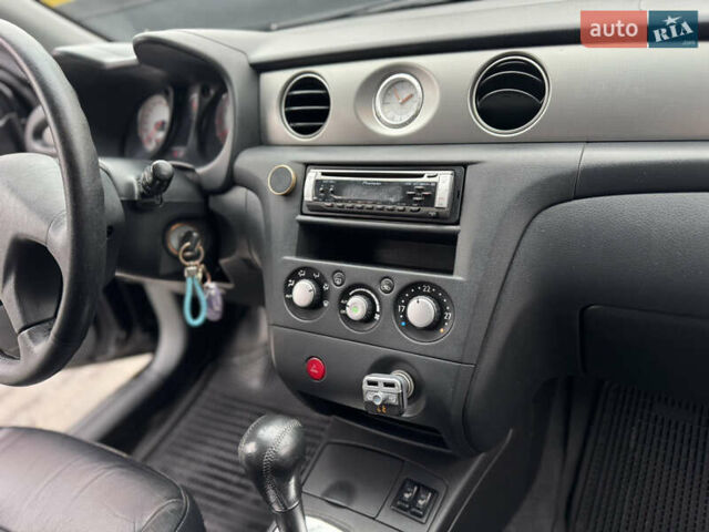 Черный Мицубиси Аутлендер, объемом двигателя 2.4 л и пробегом 242 тыс. км за 6800 $, фото 58 на Automoto.ua