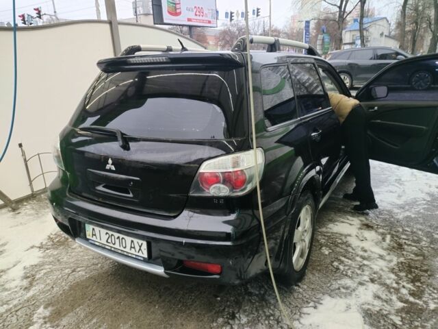 Чорний Міцубісі Аутлендер, об'ємом двигуна 2.4 л та пробігом 360 тис. км за 5200 $, фото 6 на Automoto.ua