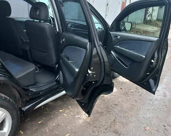 Черный Мицубиси Аутлендер, объемом двигателя 2.4 л и пробегом 256 тыс. км за 6900 $, фото 6 на Automoto.ua