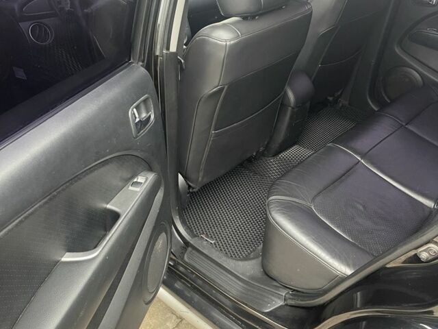 Чорний Міцубісі Аутлендер, об'ємом двигуна 2.4 л та пробігом 277 тис. км за 6700 $, фото 8 на Automoto.ua