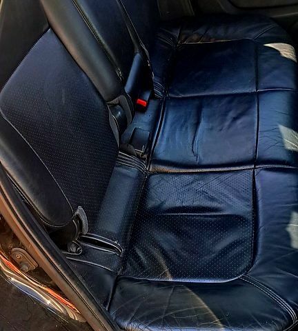 Черный Мицубиси Аутлендер, объемом двигателя 2.4 л и пробегом 185 тыс. км за 7500 $, фото 2 на Automoto.ua