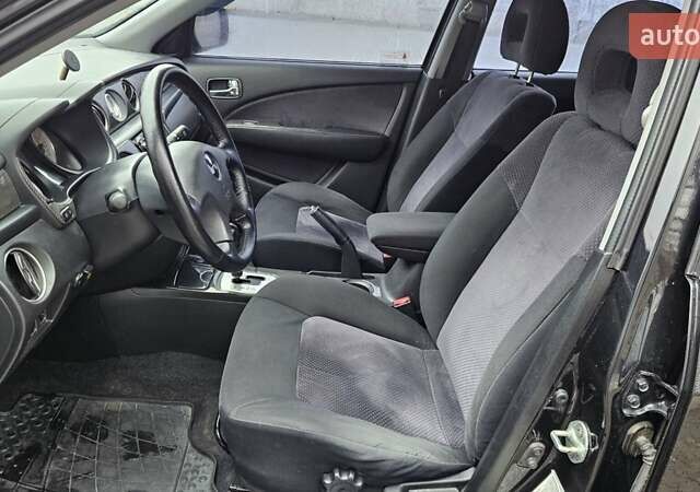 Черный Мицубиси Аутлендер, объемом двигателя 2.4 л и пробегом 167 тыс. км за 6150 $, фото 26 на Automoto.ua