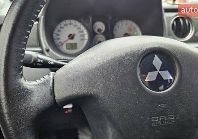 Черный Мицубиси Аутлендер, объемом двигателя 2.4 л и пробегом 167 тыс. км за 6150 $, фото 33 на Automoto.ua