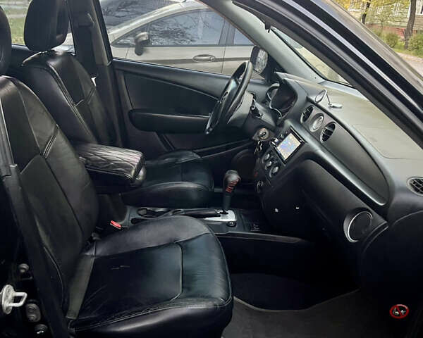 Чорний Міцубісі Аутлендер, об'ємом двигуна 2.38 л та пробігом 247 тис. км за 5499 $, фото 65 на Automoto.ua