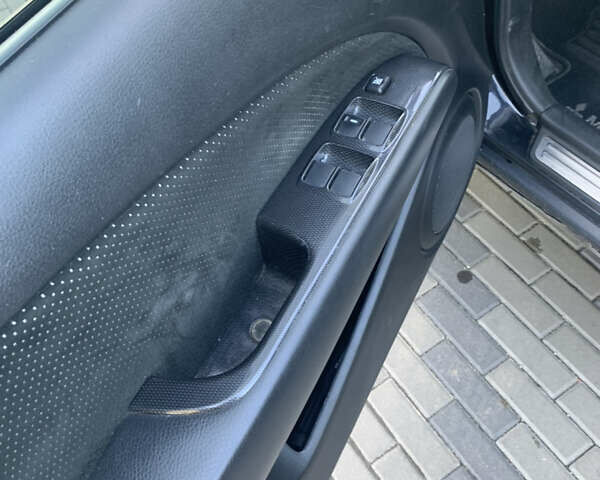 Черный Мицубиси Аутлендер, объемом двигателя 2 л и пробегом 212 тыс. км за 6000 $, фото 20 на Automoto.ua