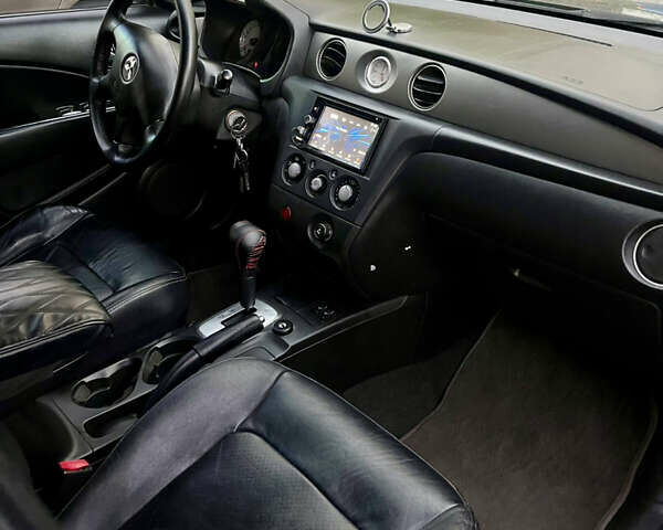 Чорний Міцубісі Аутлендер, об'ємом двигуна 2.38 л та пробігом 247 тис. км за 5499 $, фото 67 на Automoto.ua