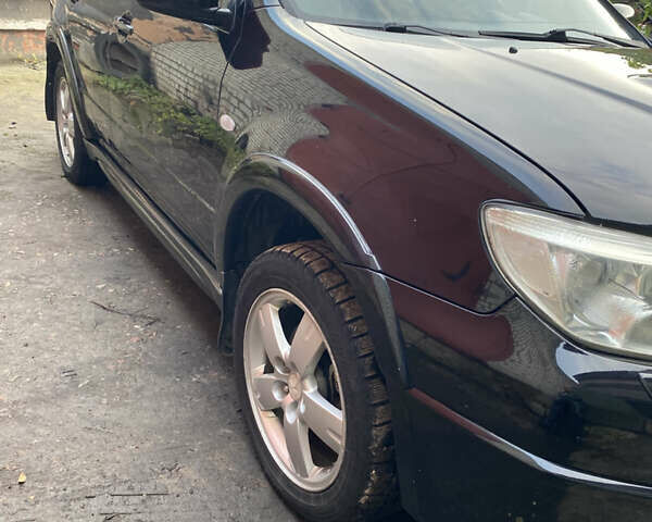 Міцубісі Аутлендер 2006 у Конотопе на Automoto.ua Чорний Міцубісі Аутлендер, об'ємом двигуна 2 л та пробігом 257 тис. км за 5800 $, фото 8 на Automoto.ua
