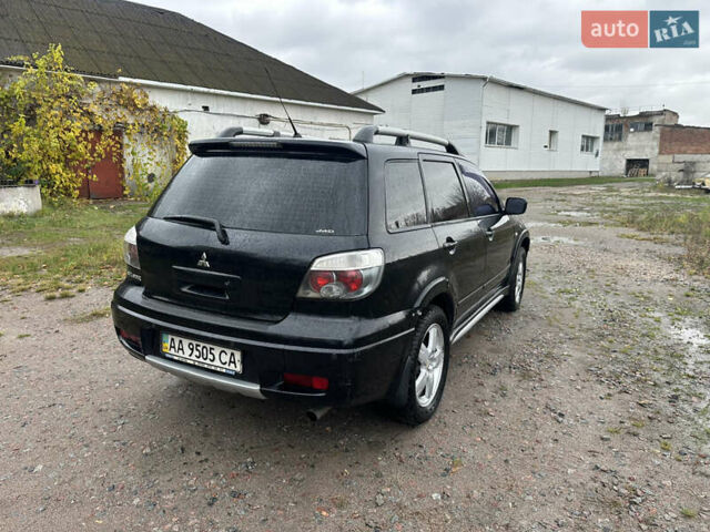 Міцубісі Аутлендер 2006 у Василькове на Automoto.ua Чорний Міцубісі Аутлендер, об'ємом двигуна 2.38 л та пробігом 220 тис. км за 4300 $, фото 1 на Automoto.ua