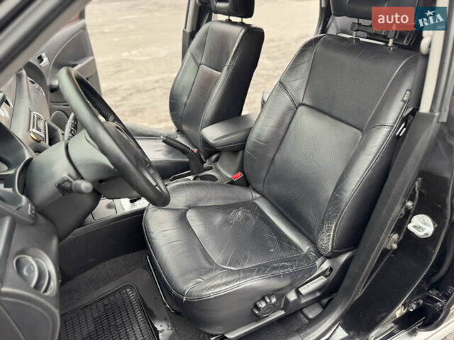 Черный Мицубиси Аутлендер, объемом двигателя 2.4 л и пробегом 242 тыс. км за 6800 $, фото 29 на Automoto.ua