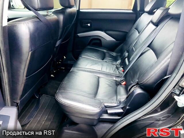 Черный Мицубиси Аутлендер, объемом двигателя 3 л и пробегом 230 тыс. км за 8999 $, фото 9 на Automoto.ua