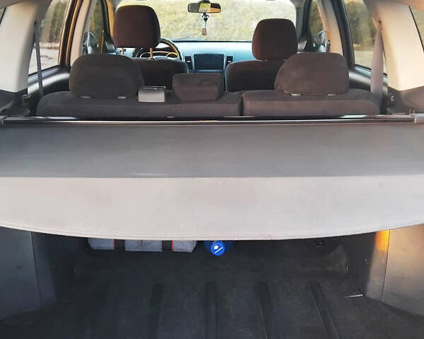 Черный Мицубиси Аутлендер, объемом двигателя 3 л и пробегом 225 тыс. км за 9200 $, фото 13 на Automoto.ua