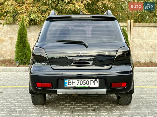 Міцубісі Аутлендер 2007 у Одесі на Automoto.ua Чорний Міцубісі Аутлендер, об'ємом двигуна 2.4 л та пробігом 201 тис. км за 7700 $, фото 10 на Automoto.ua
