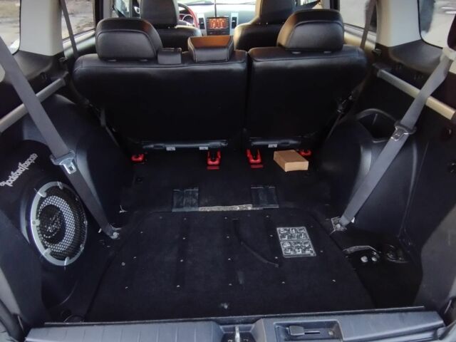 Черный Мицубиси Аутлендер, объемом двигателя 2 л и пробегом 290 тыс. км за 4900 $, фото 7 на Automoto.ua